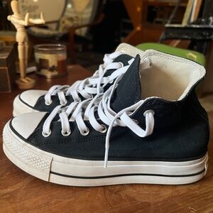 Black and White High-Top Converse Platform Sneakers